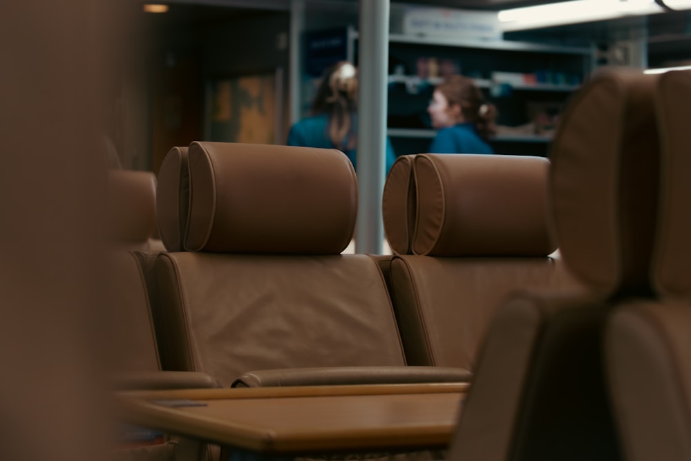 a row of brown seats sitting next to each other