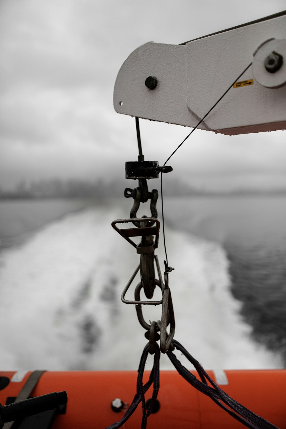 a close up of the front of a boat on a body of water