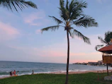 A panoramic shot of the Riviera Maya beach at sunset, symbolizing growth and opportunity.