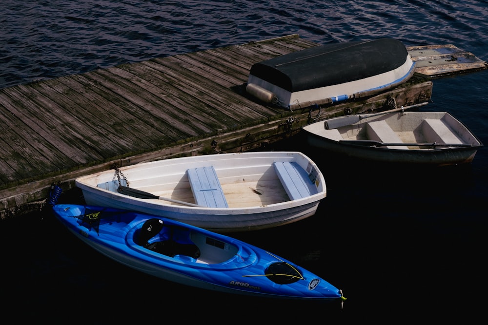 a couple of boats that are sitting in the water