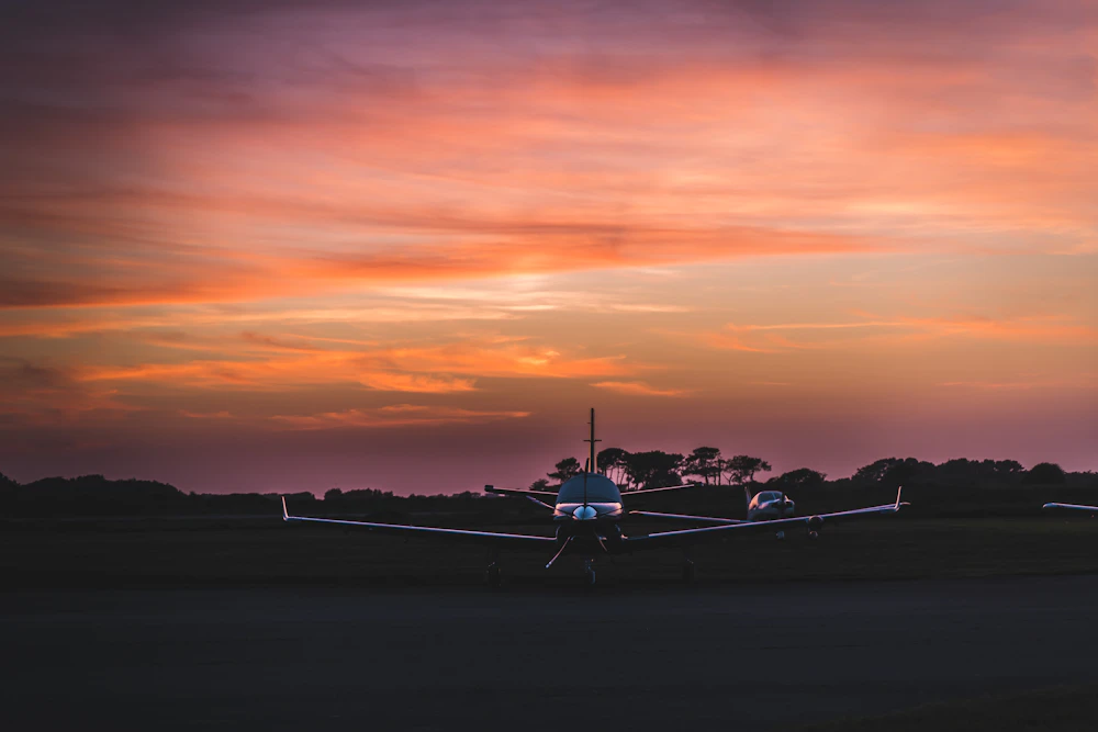 Pilot walking around their aircraft at a GA airport