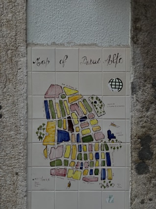 A vibrant interactive map showcasing the heritage and tourist spots of Rijal Alma with colorful icons.