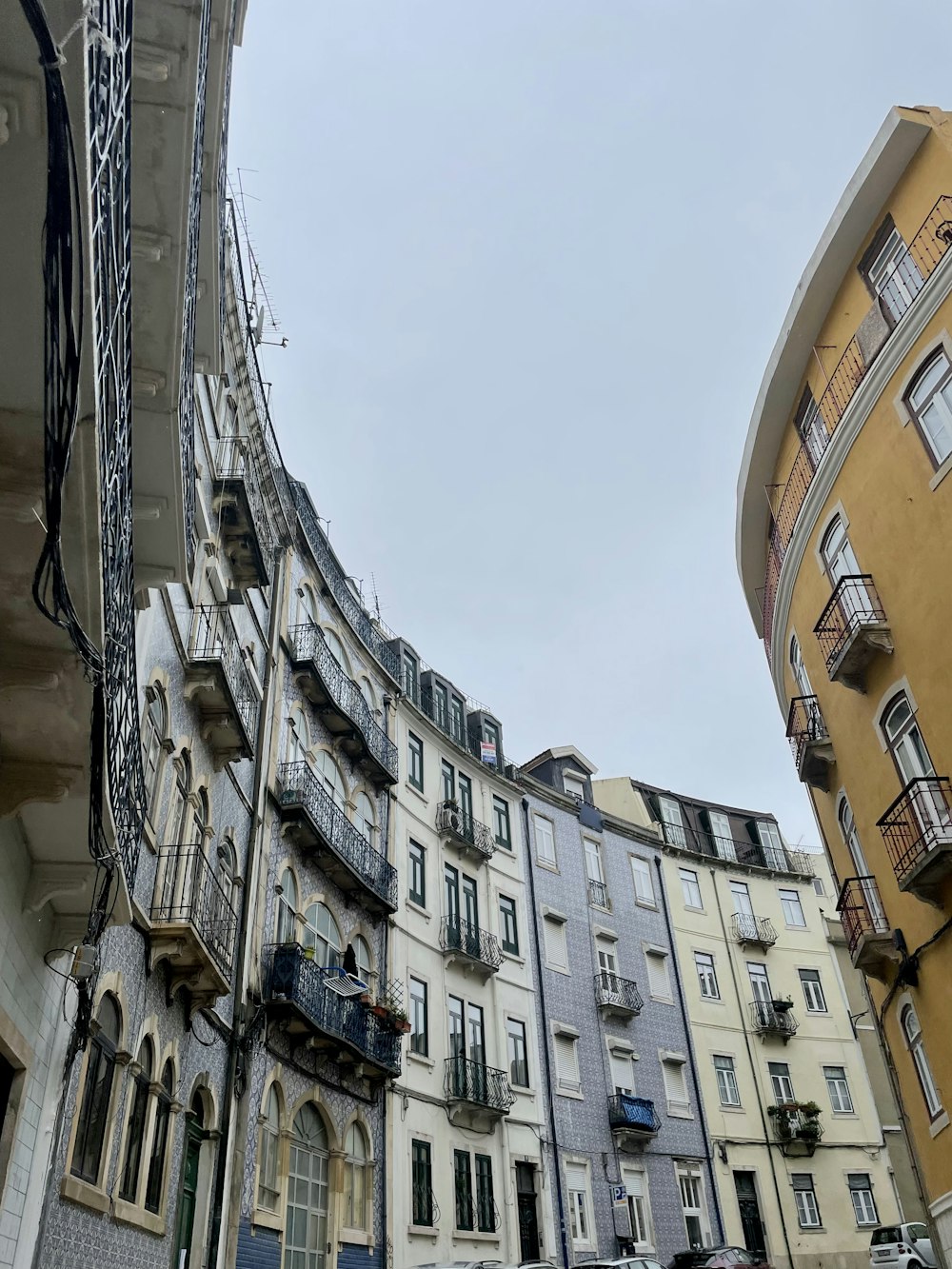 a row of buildings with balconies and balconies on them