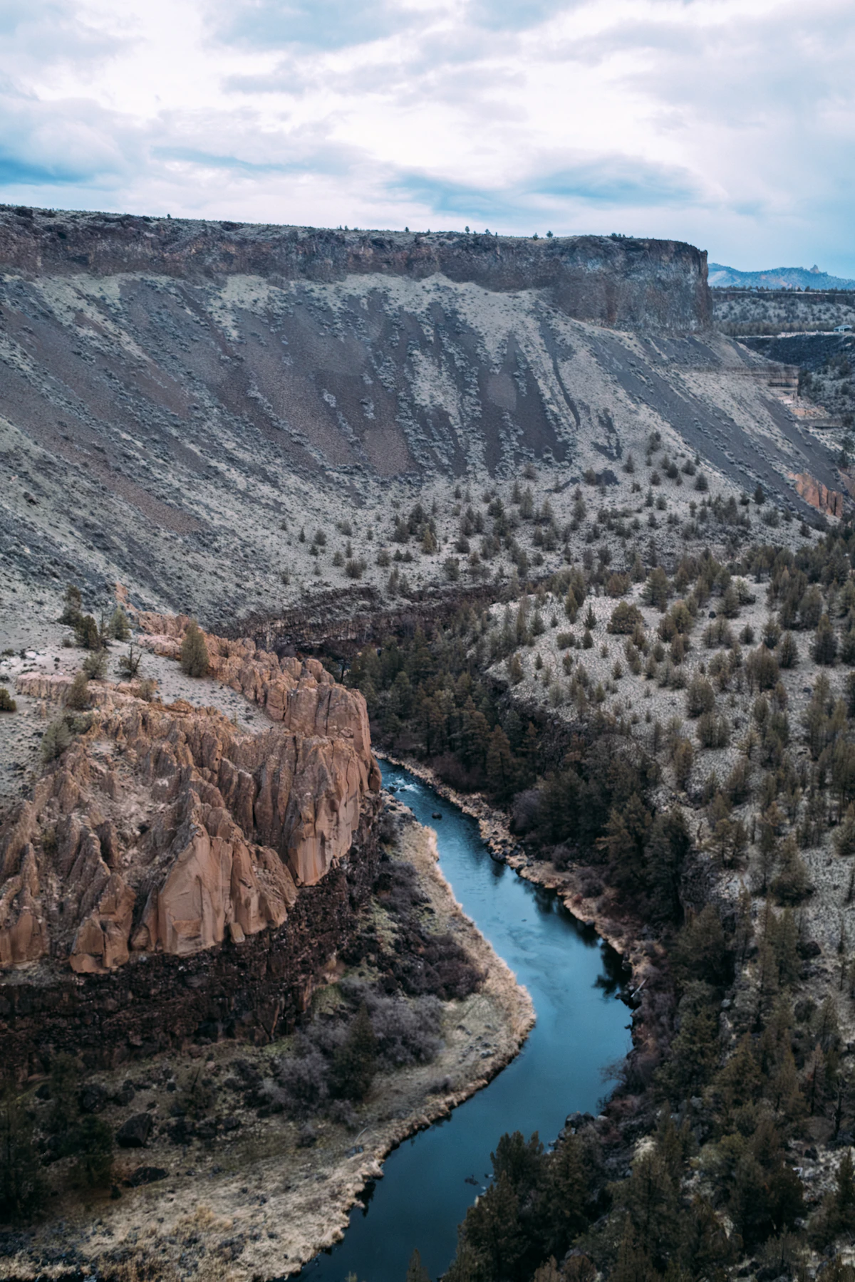 A river bending through a high-desert valley — the Crooked River cuts the same shape