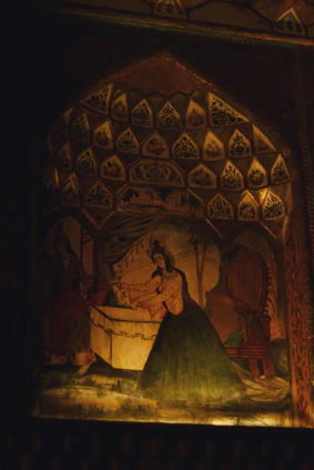 A detailed Kerala mural painting featuring vibrant colors and intricate patterns reflecting cultural stories.