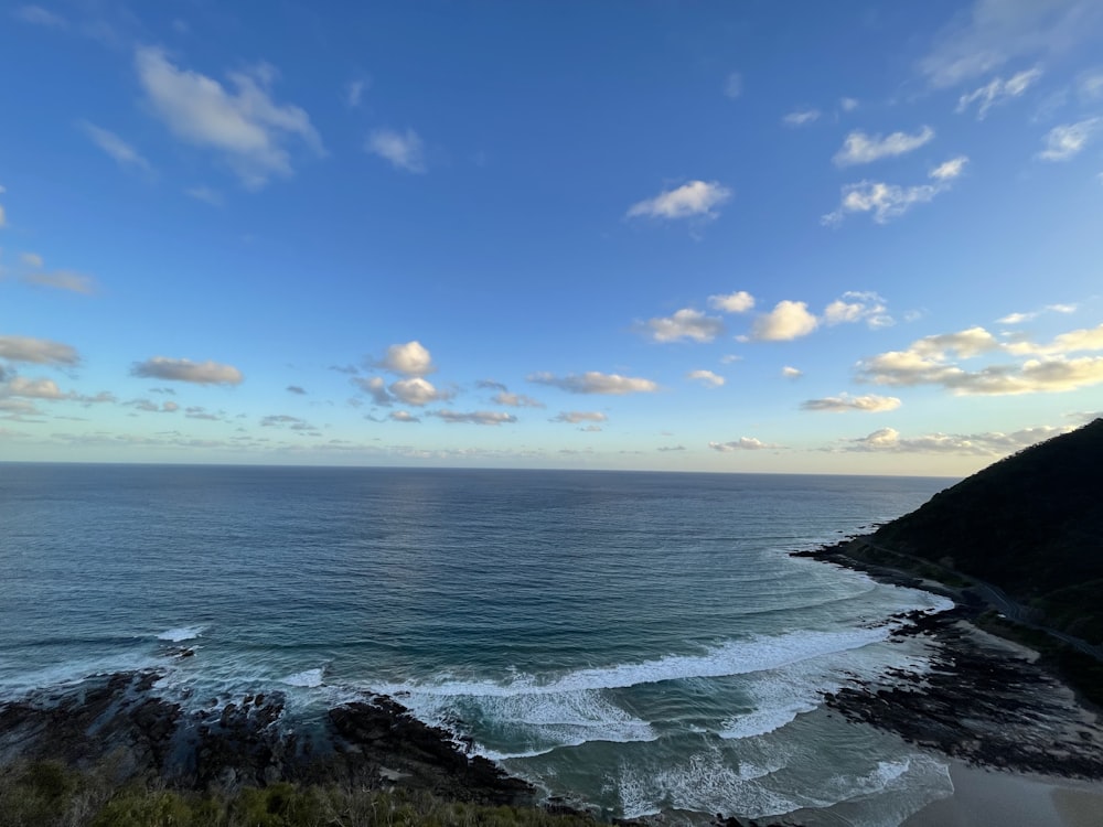 a view of the ocean from a cliff