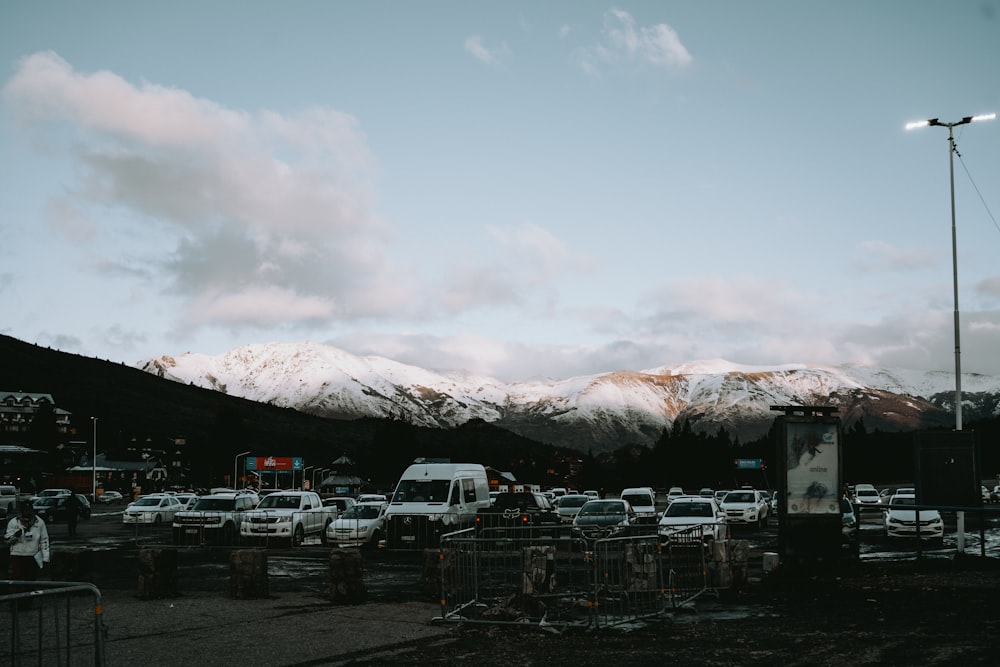 a parking lot filled with lots of parked cars