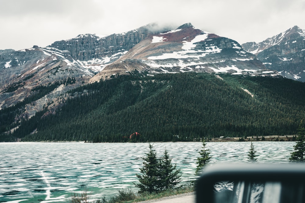 a view of a mountain range from a car window