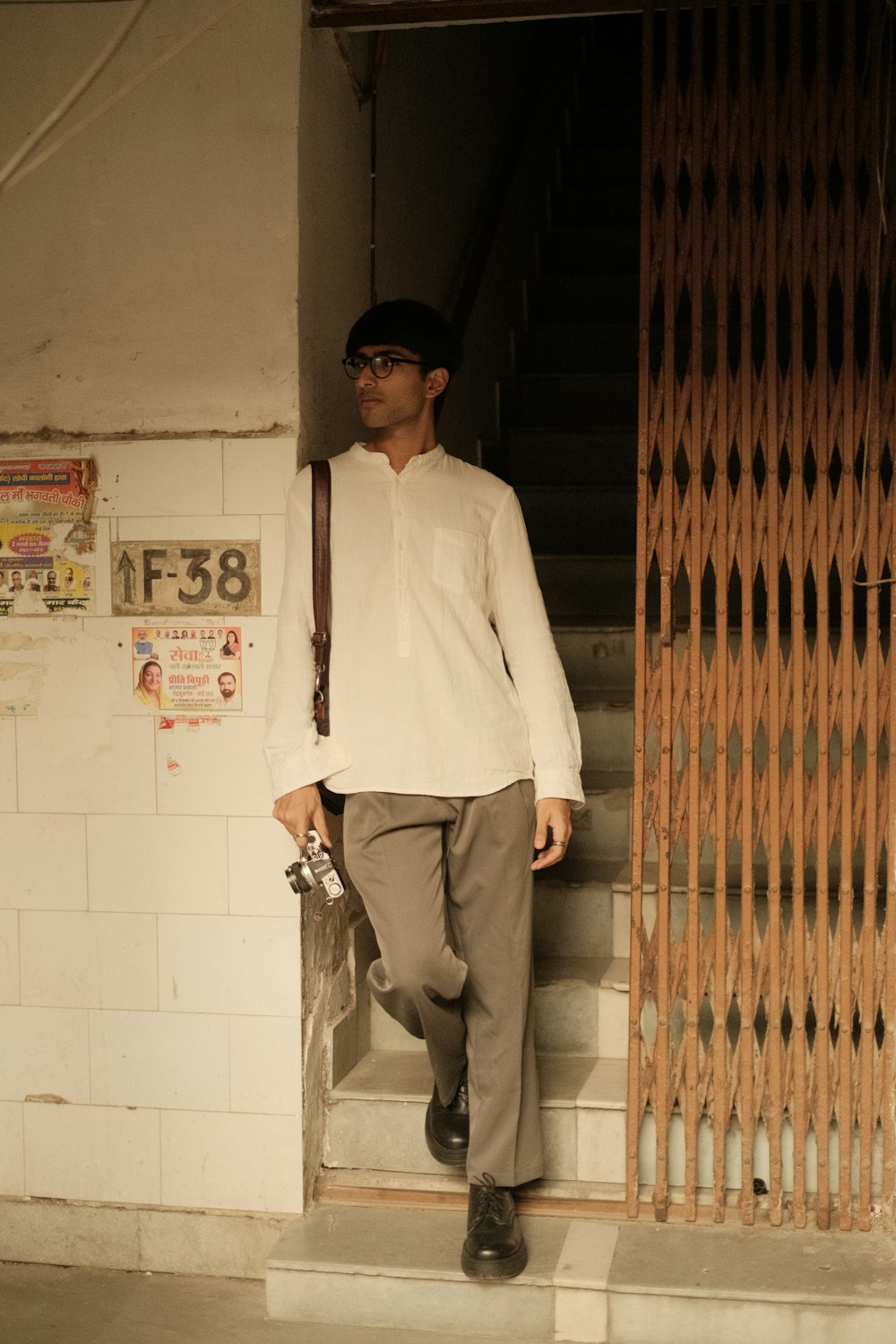 A man in a white shirt and brown pants photo – Free Delhi Image on Unsplash