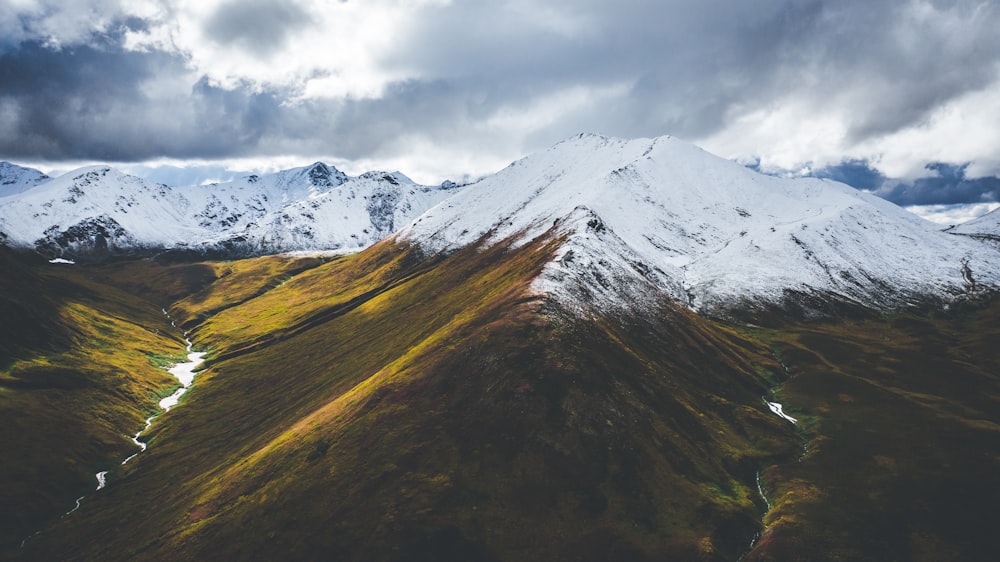 a view of a snow covered mountain range