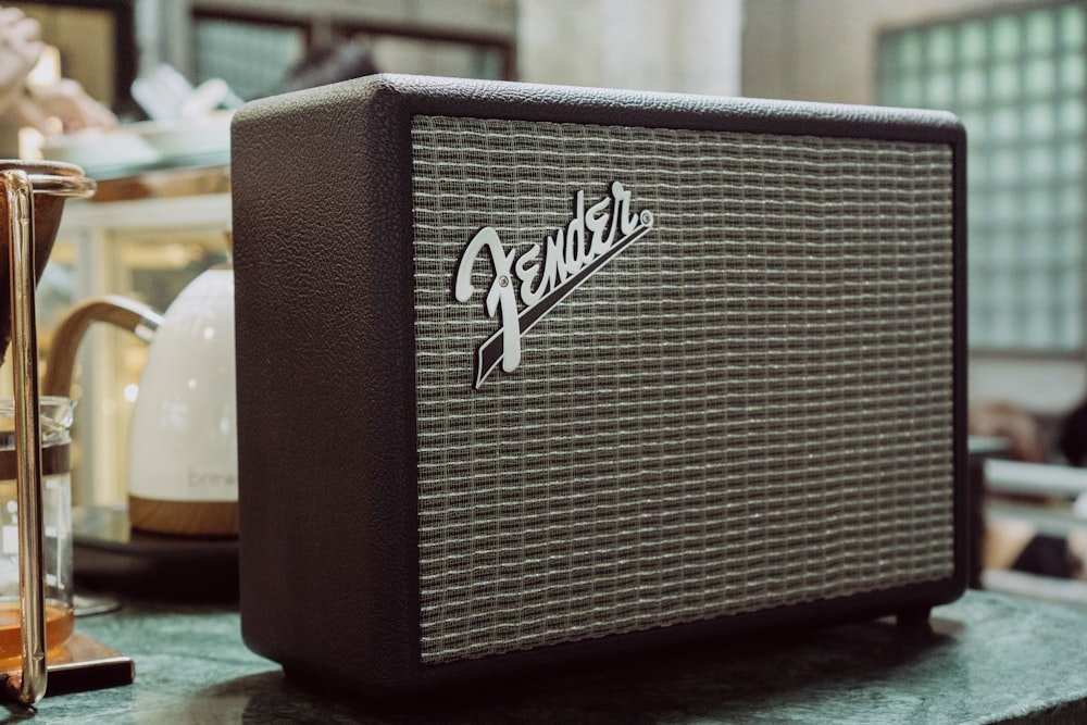 a close up of a speaker on a table