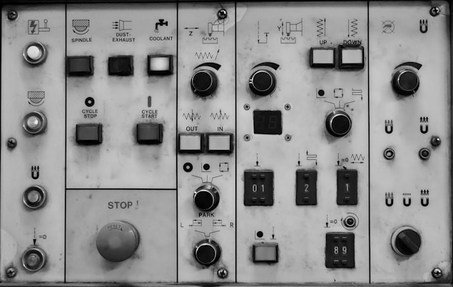 a close up of a control panel with buttons and switches