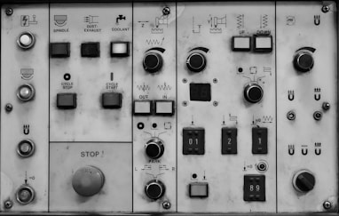 a close up of a control panel with buttons and switches
