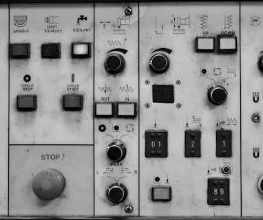 a close up of a control panel with buttons and switches
