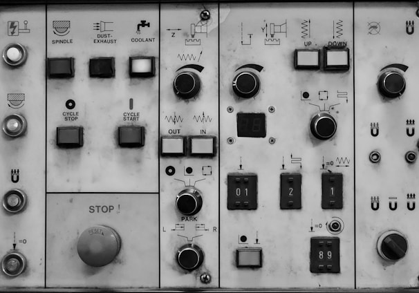 a close up of a control panel with buttons and switches