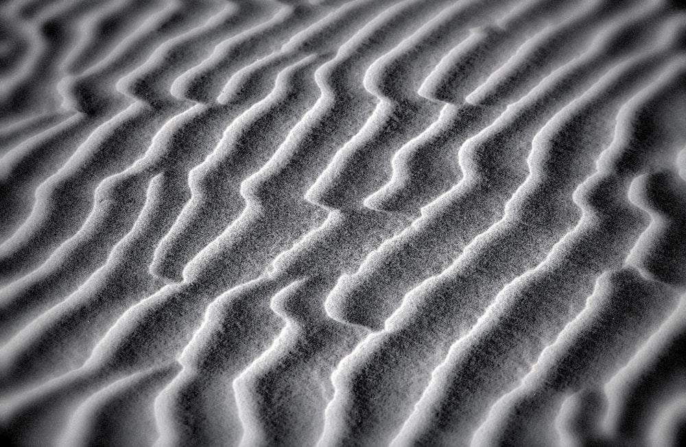 Un primer plano de un patrón de dunas de arena