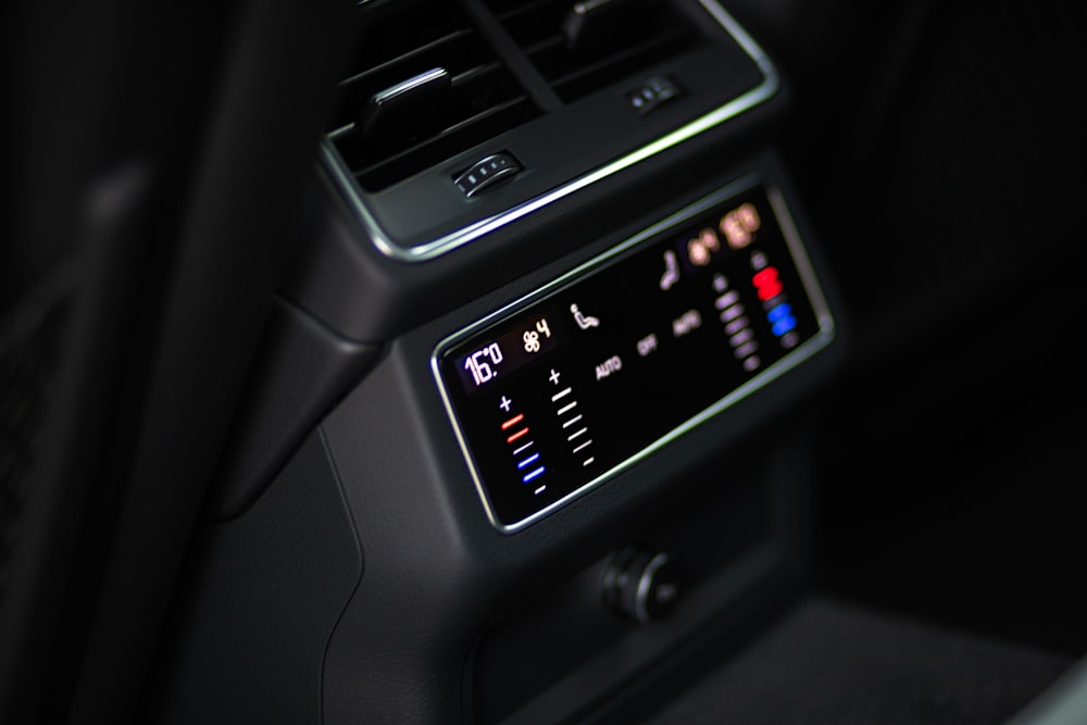 a close up of a radio in a car