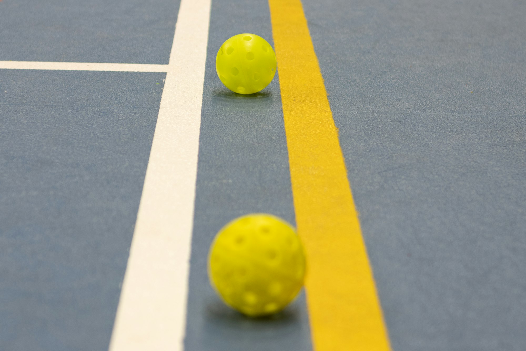 Pickleball Balls on the pickleball court