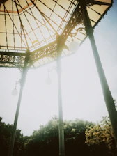 Elegant pergola and gazebo structures showcasing fine metalwork craftsmanship.