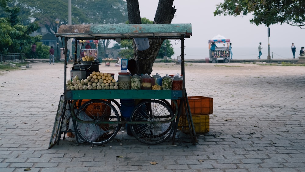 a cart with a bunch of fruit on it