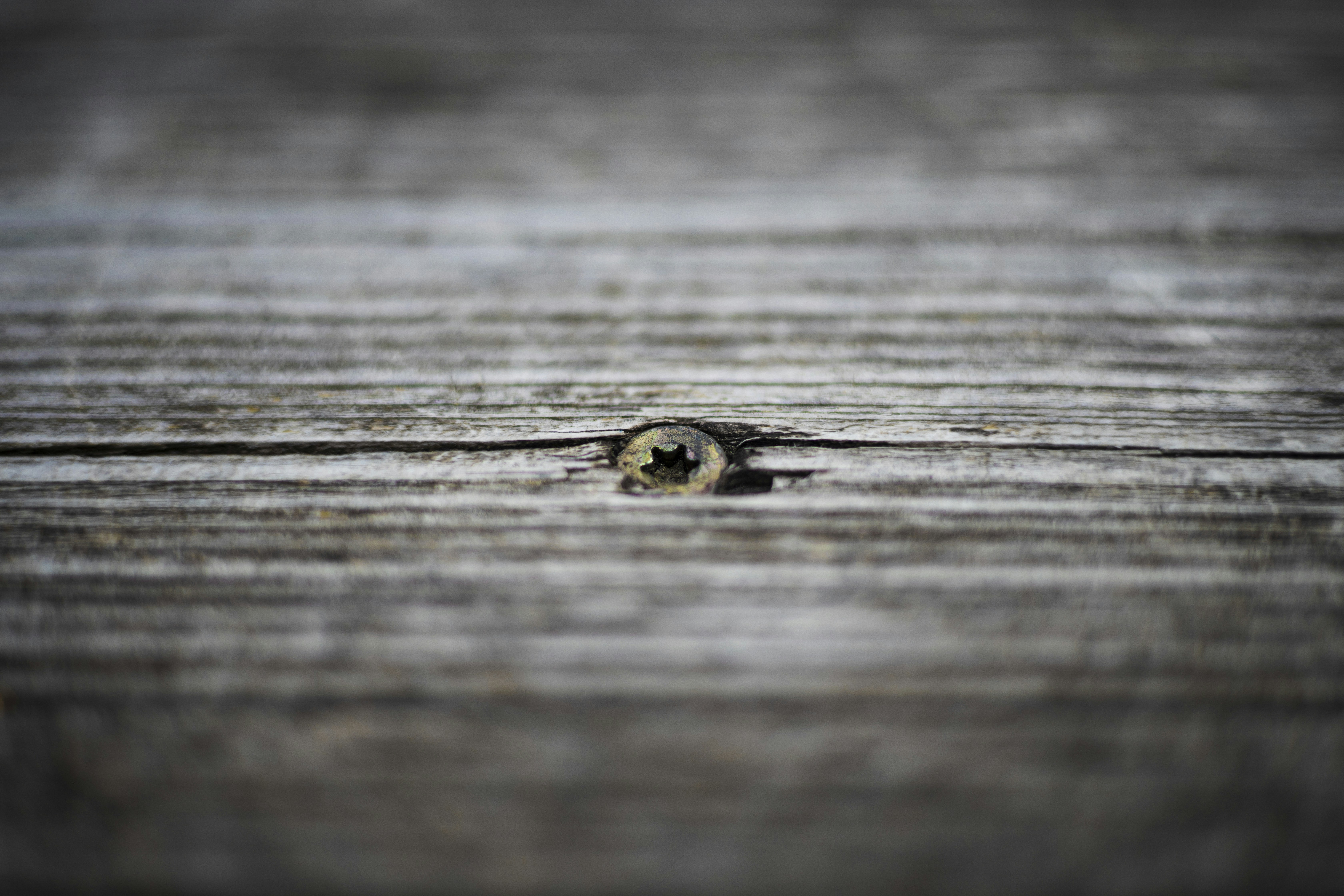 a close up of a piece of wood with a hole in it