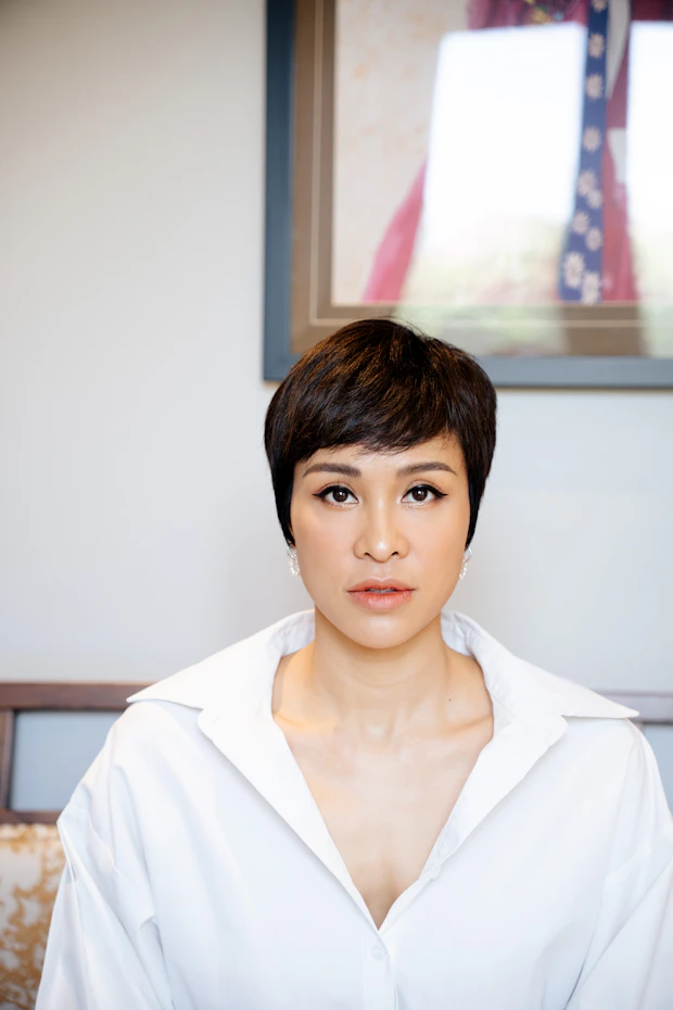 Portrait of Grace Tan, Clinical Care Lead, in a white shirt