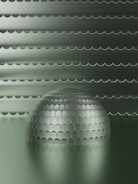 a shiny ball is sitting in the middle of a room