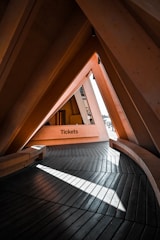 a wooden floor with a sign that reads ticket