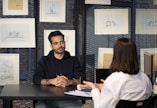 a man and a woman sitting at a table