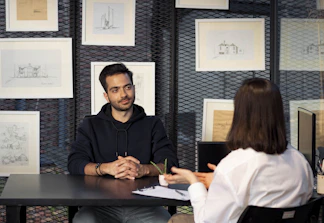 a man and a woman sitting at a table