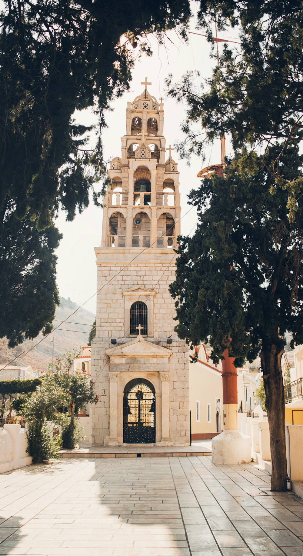 a tall tower with a clock on the top of it