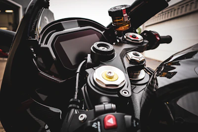 Close-up of a Yamaha bike's dashboard and controls, highlighting precision and design.