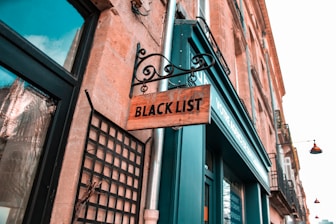 a sign that is on the side of a building