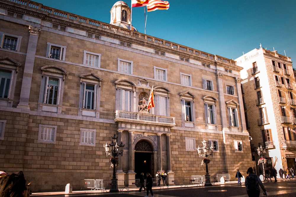 a large building with a flag on top of it