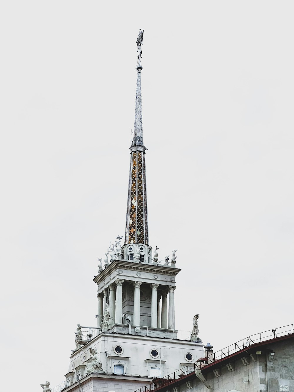 a very tall building with a very tall spire