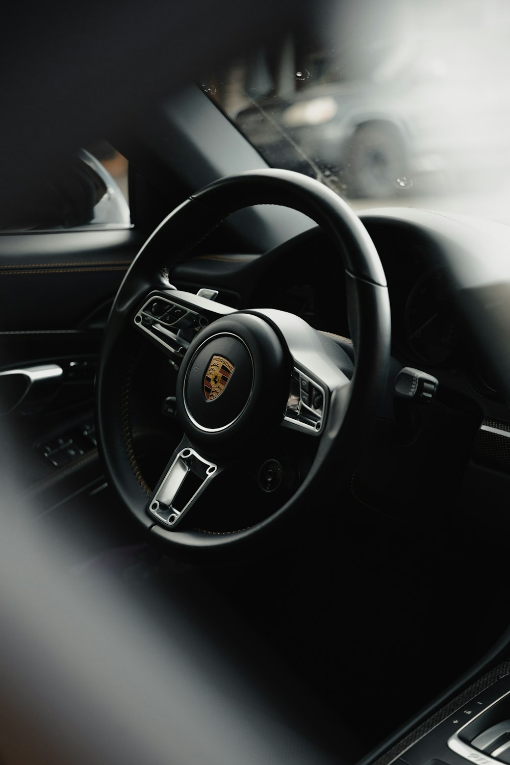 the interior of a car with a steering wheel