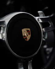 Simple icon illustrating a car with a lock symbolizing car equity credit options.