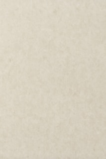 a white wall with a clock on it