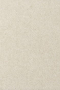 a white wall with a clock on it