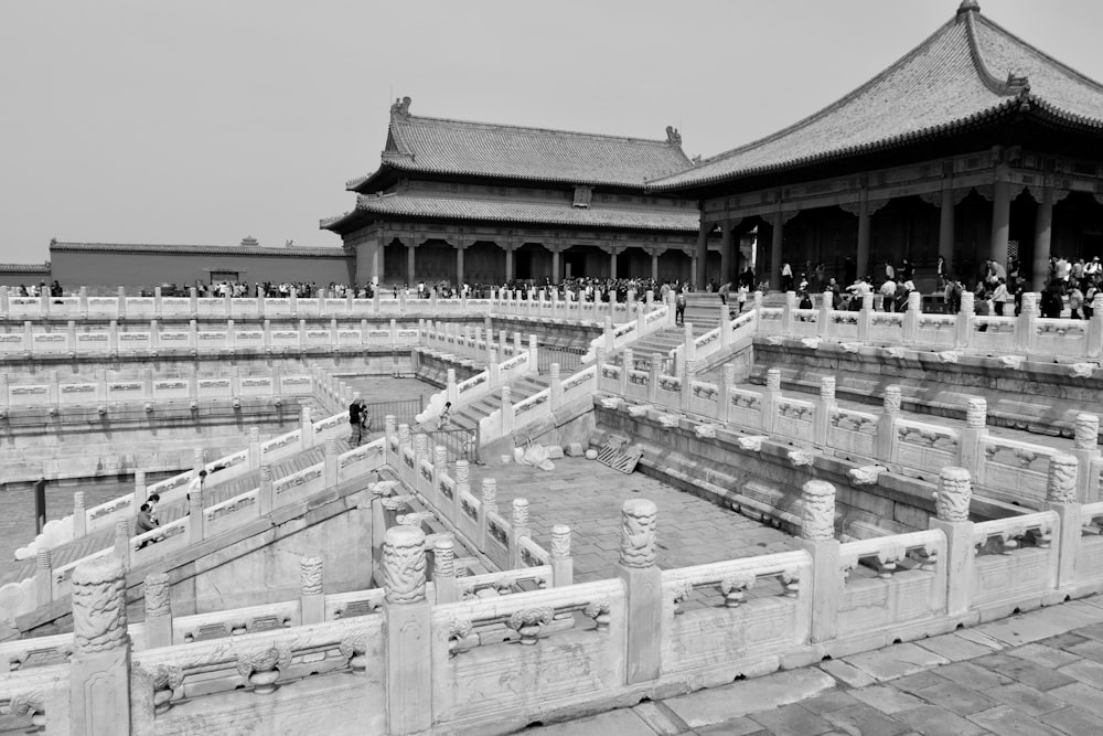 a black and white photo of a chinese building