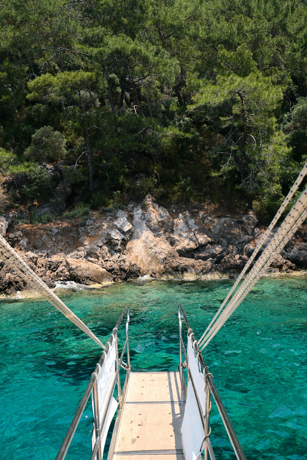 a boat floating on top of a body of water