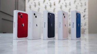 A clean, elegant lineup of the latest iPhone models showcasing different capacities.
