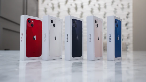 A clean, elegant lineup of the latest iPhone models showcasing different capacities.