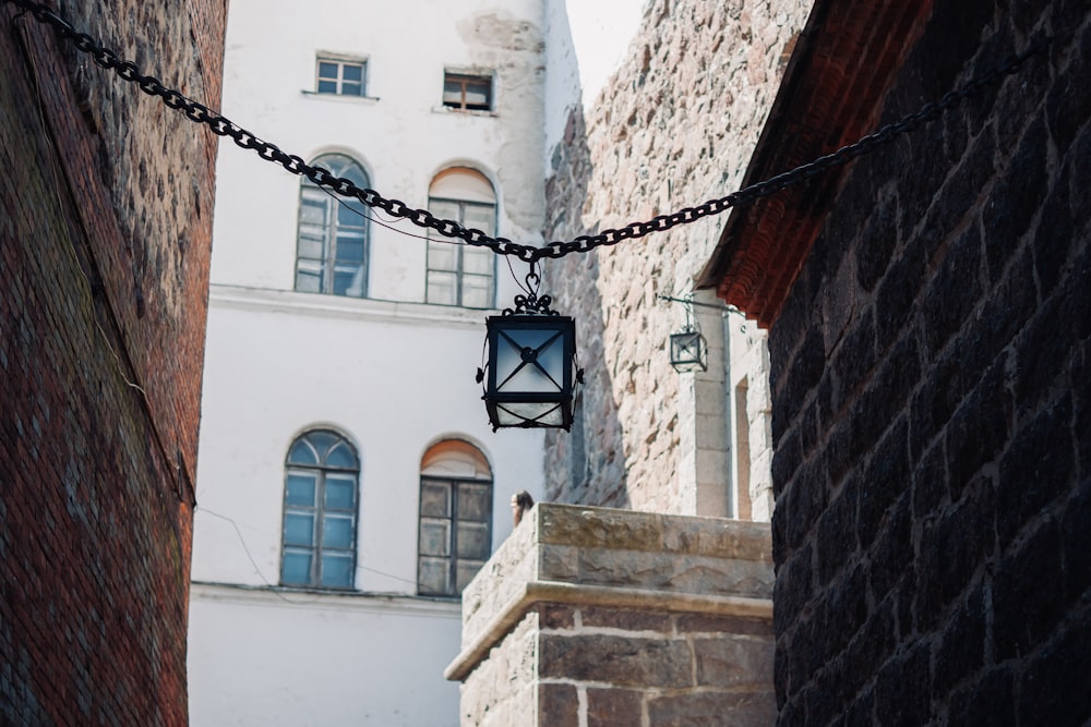 a chain hanging from the side of a building