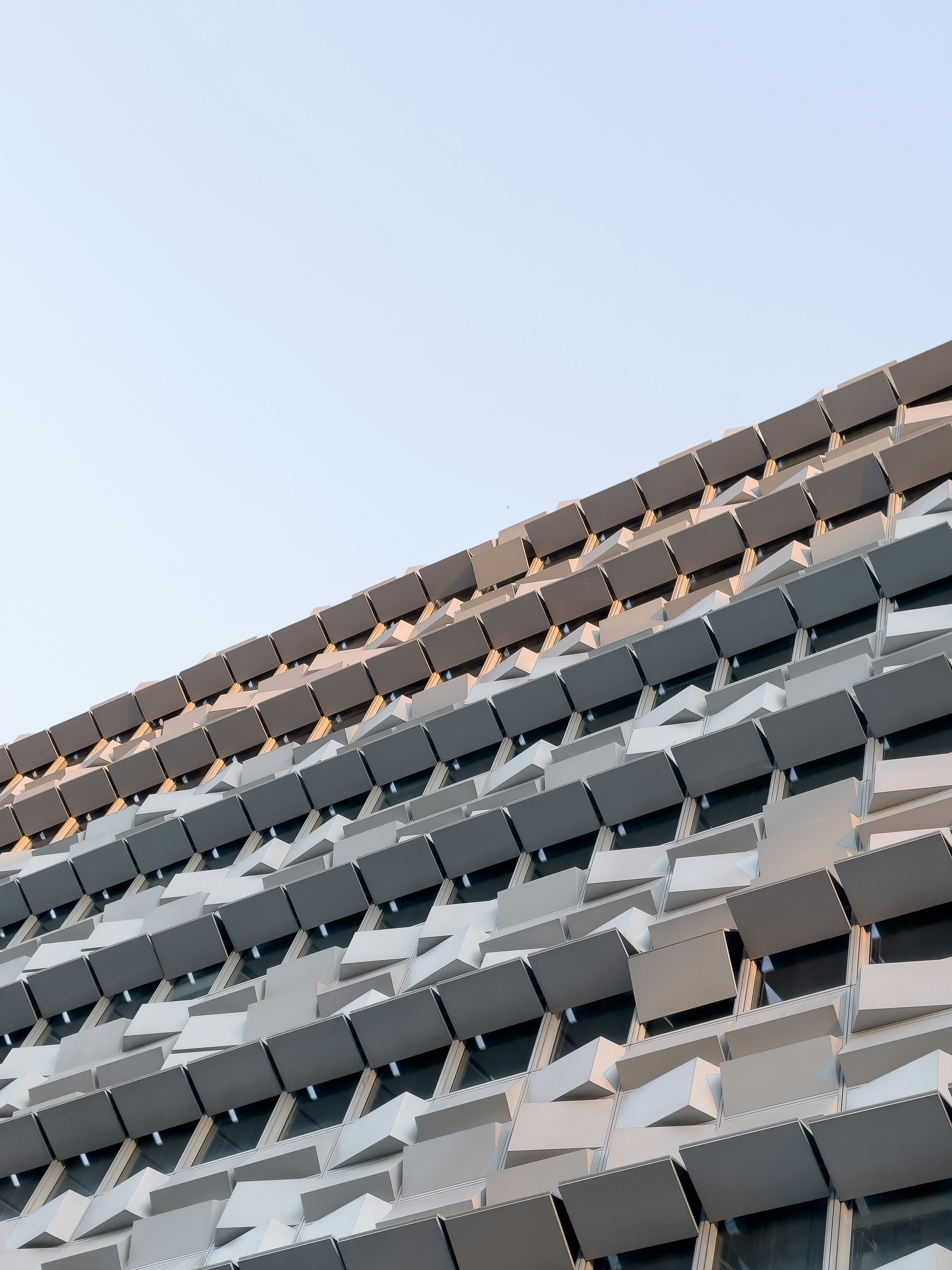 a close up of a building with a sky background
