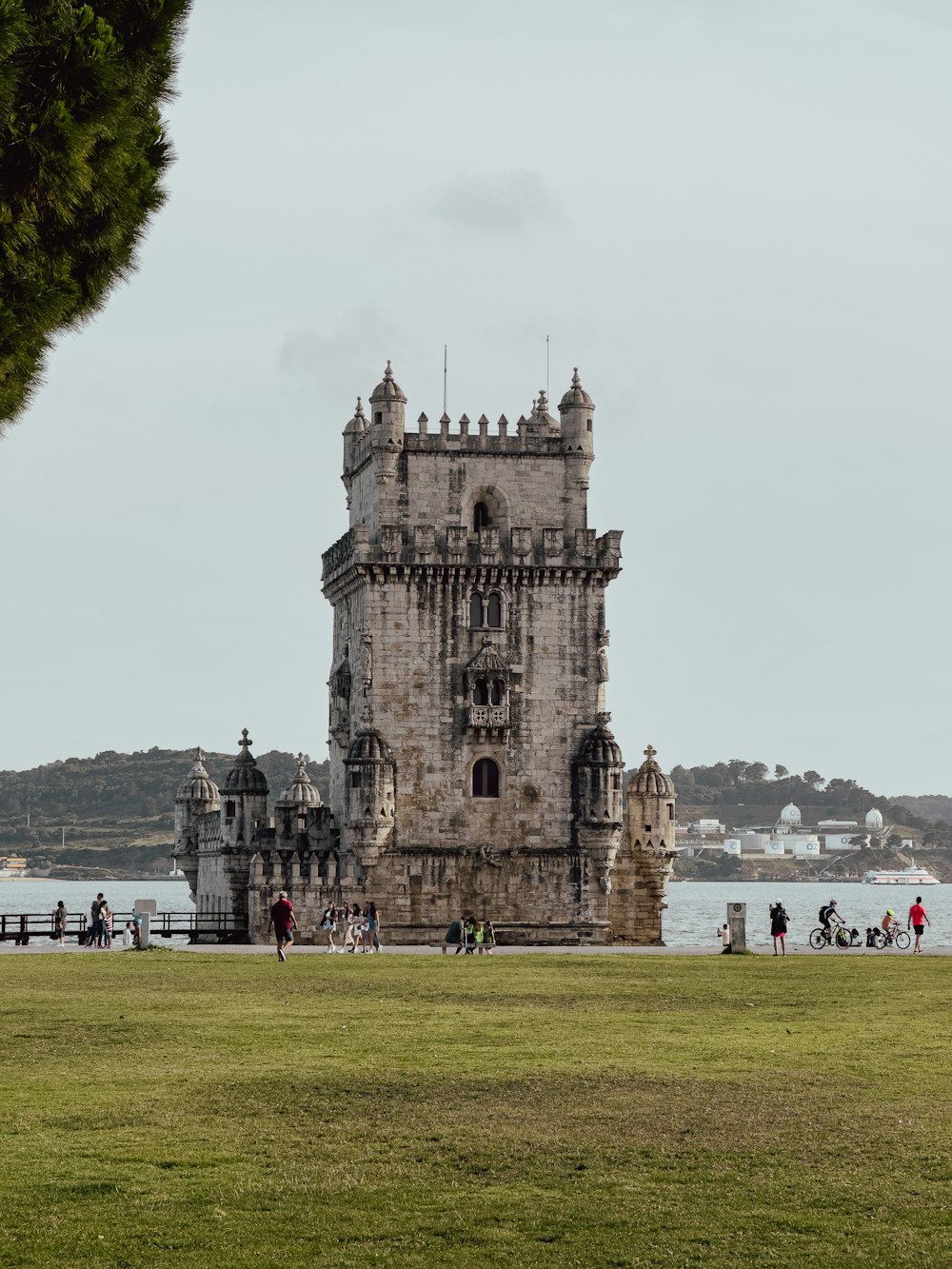 a tall tower with a clock on the top of it