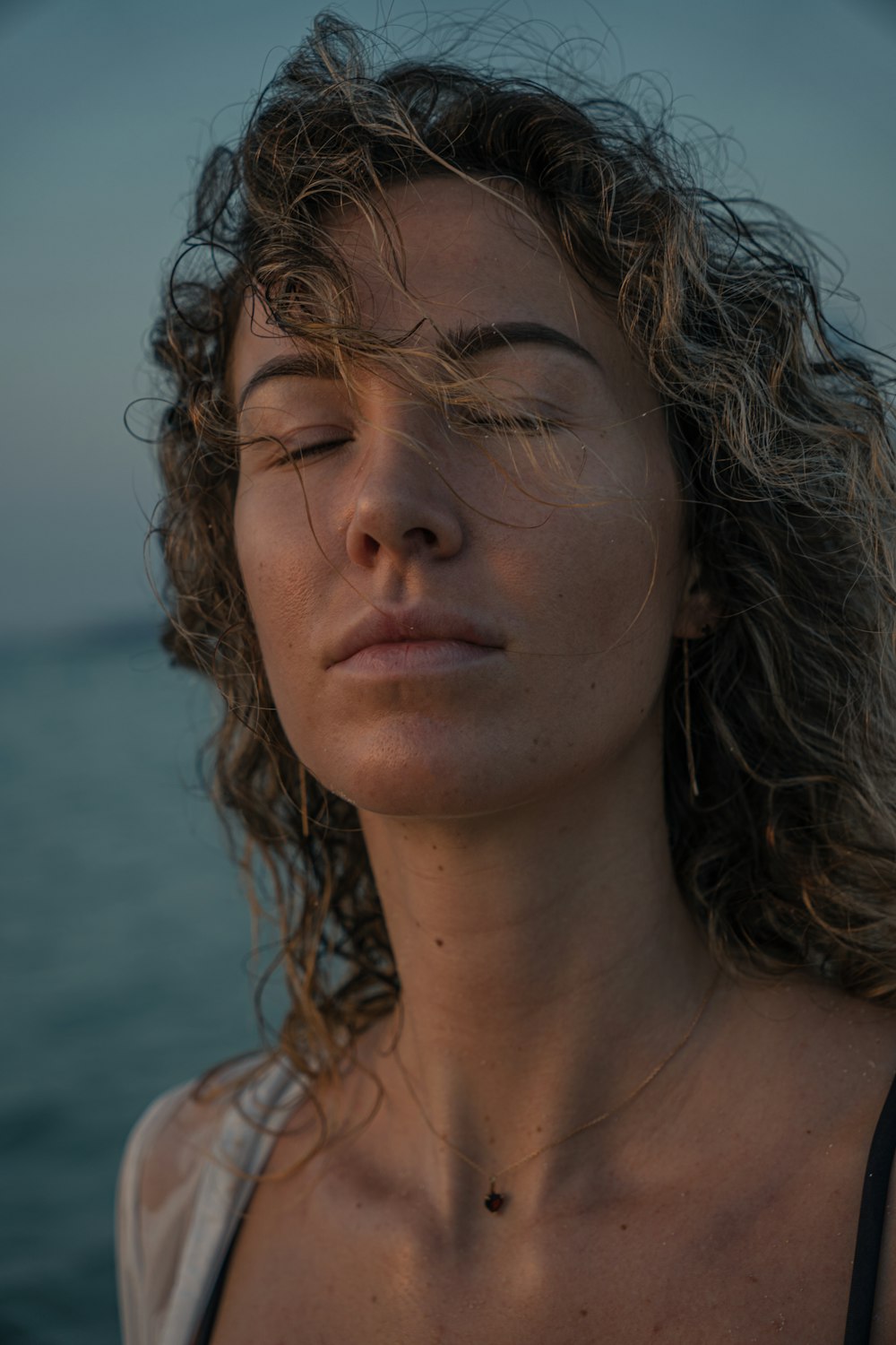 a close up of a person near the water