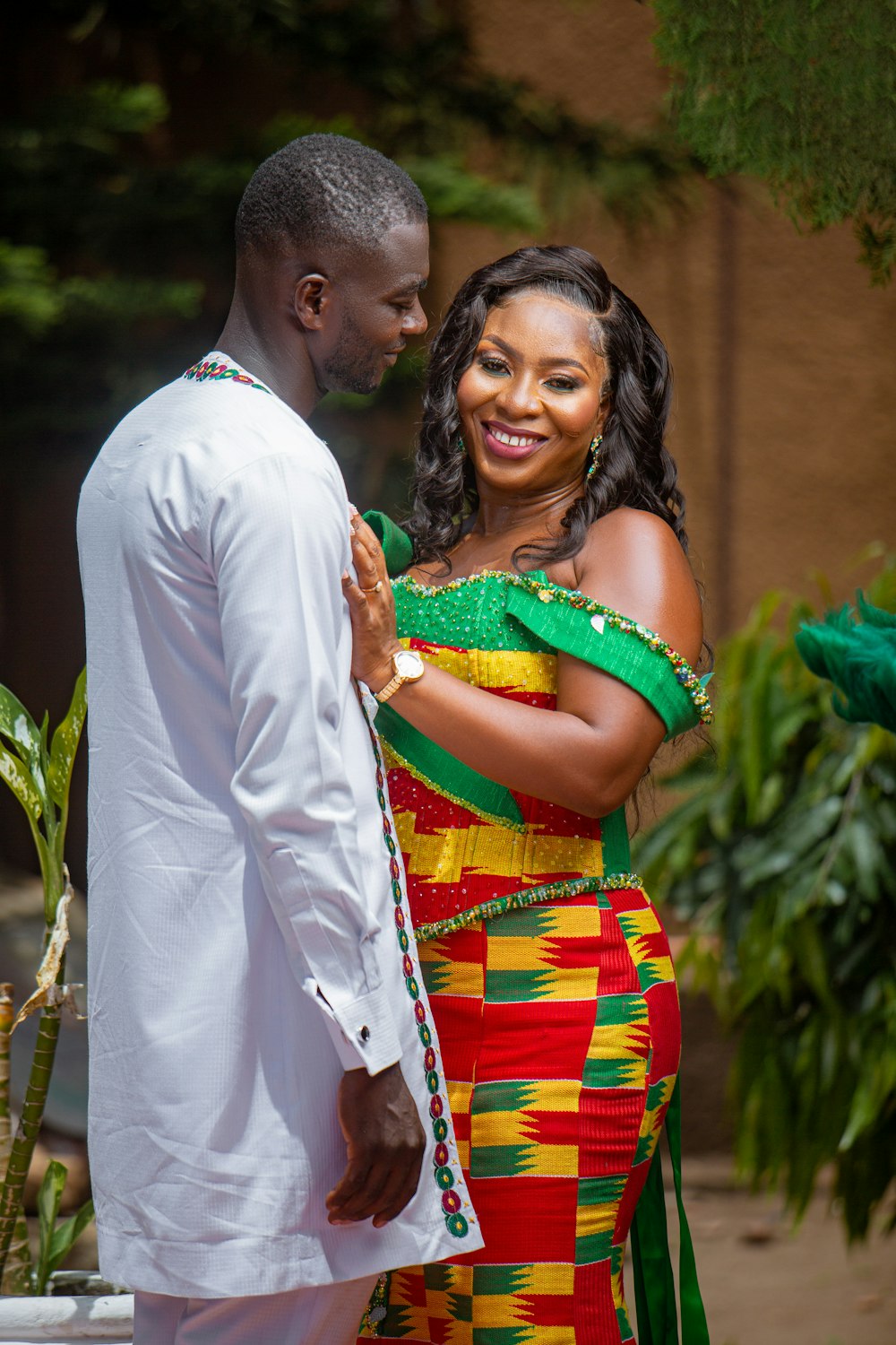 a man and a woman standing next to each other