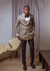 A classy, professional portrait of Duncan Brand in a modern office setting.