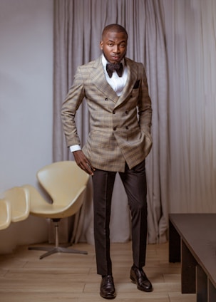 A classy, professional portrait of Duncan Brand in a modern office setting.